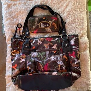 Sak  bag/walletThis has been used quite a bit, has an ink mark inside no rips.